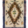 Brown, beige tone navy blue , lilac framed high pile, floral design , diamond pattern tulu rug