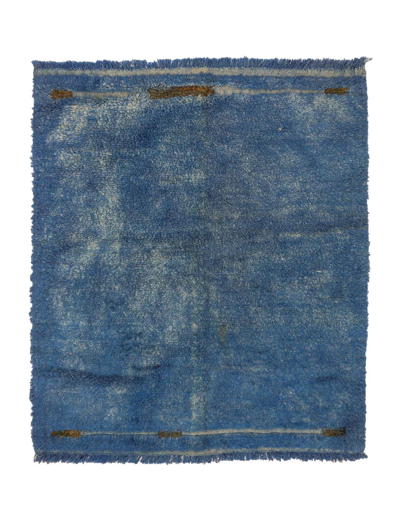 ink blue, partly distressed faded vintage tulu accent rug