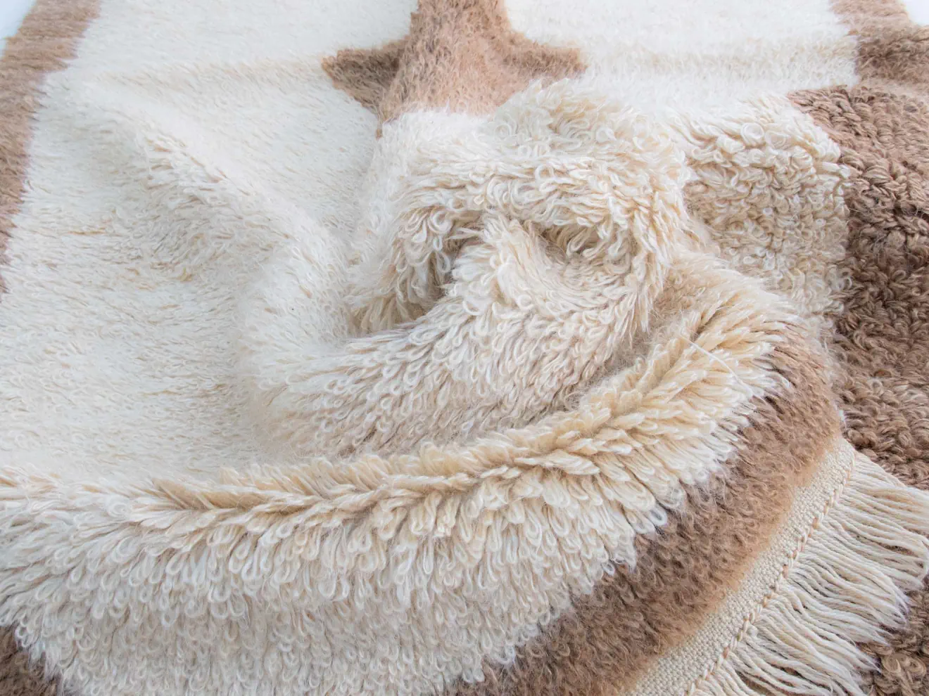 Brown, ivory, tone framed, high pile, , diamond pattern Tulu rug