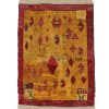 antique tulu rug, red framed with archaic tribal patterns, warm yellow color
