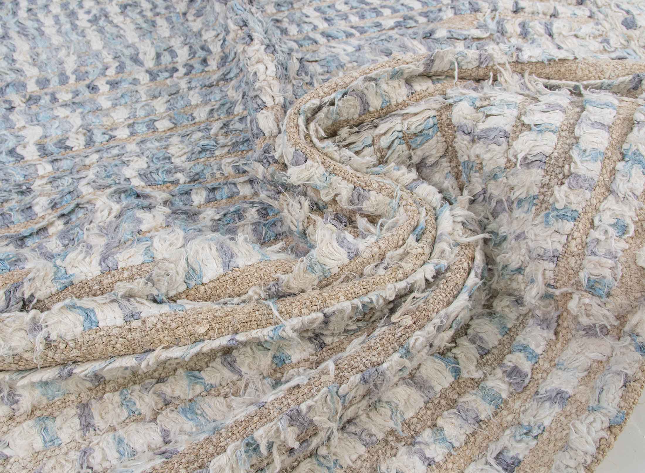 blue beige high pile pompom rug