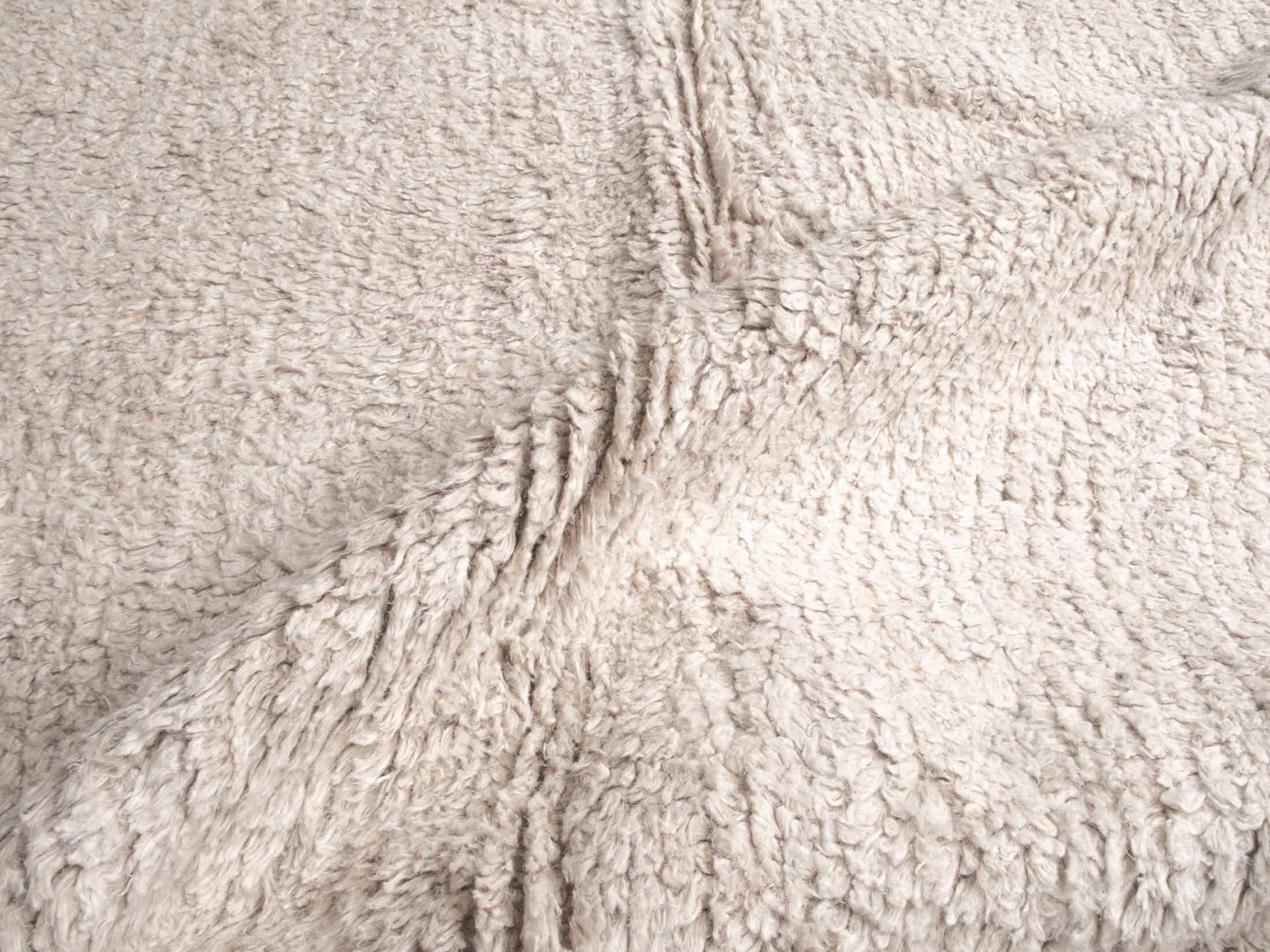 solid natural hemp color large area pompom rug