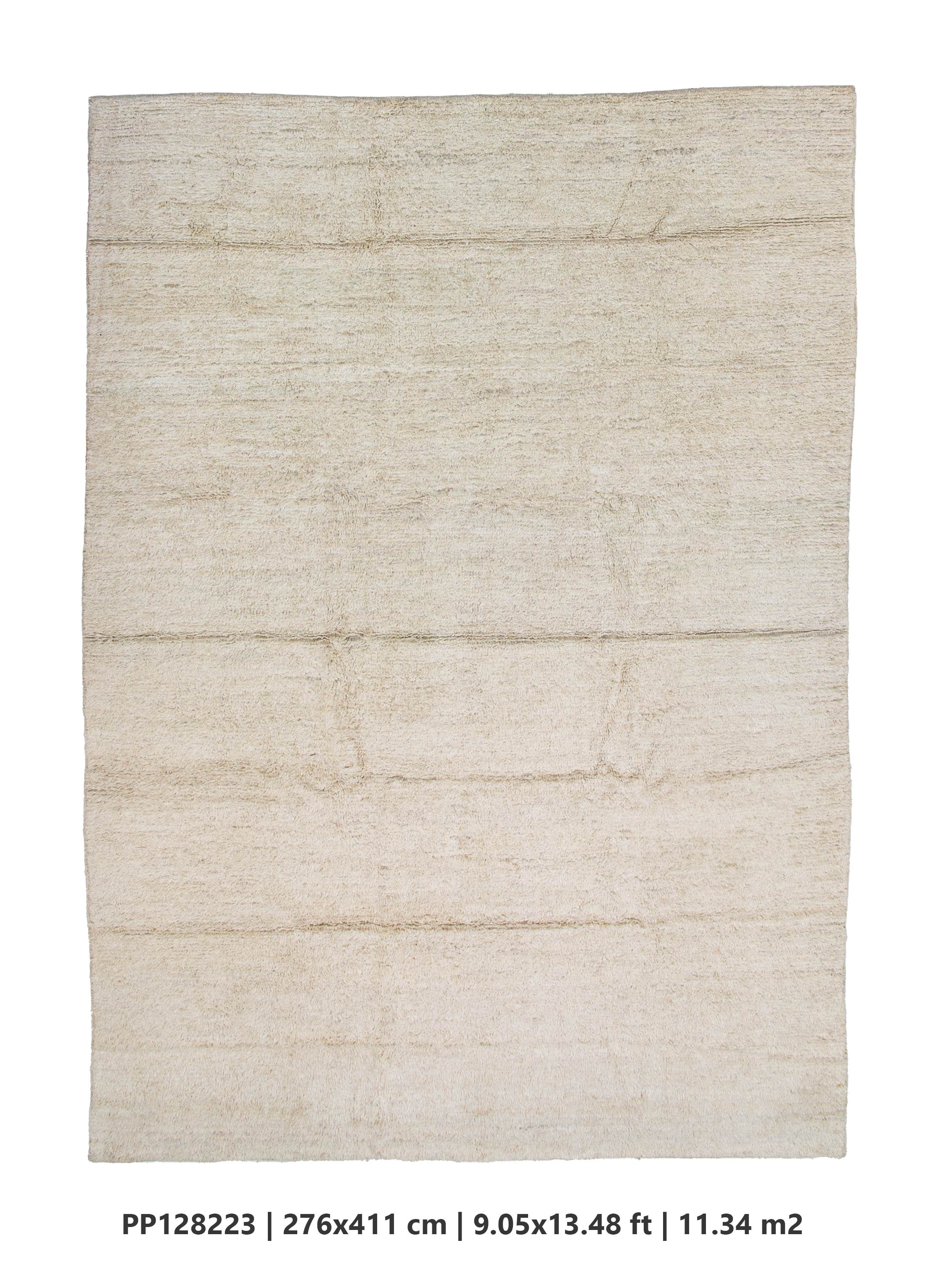 solid natural hemp color large area pompom rug