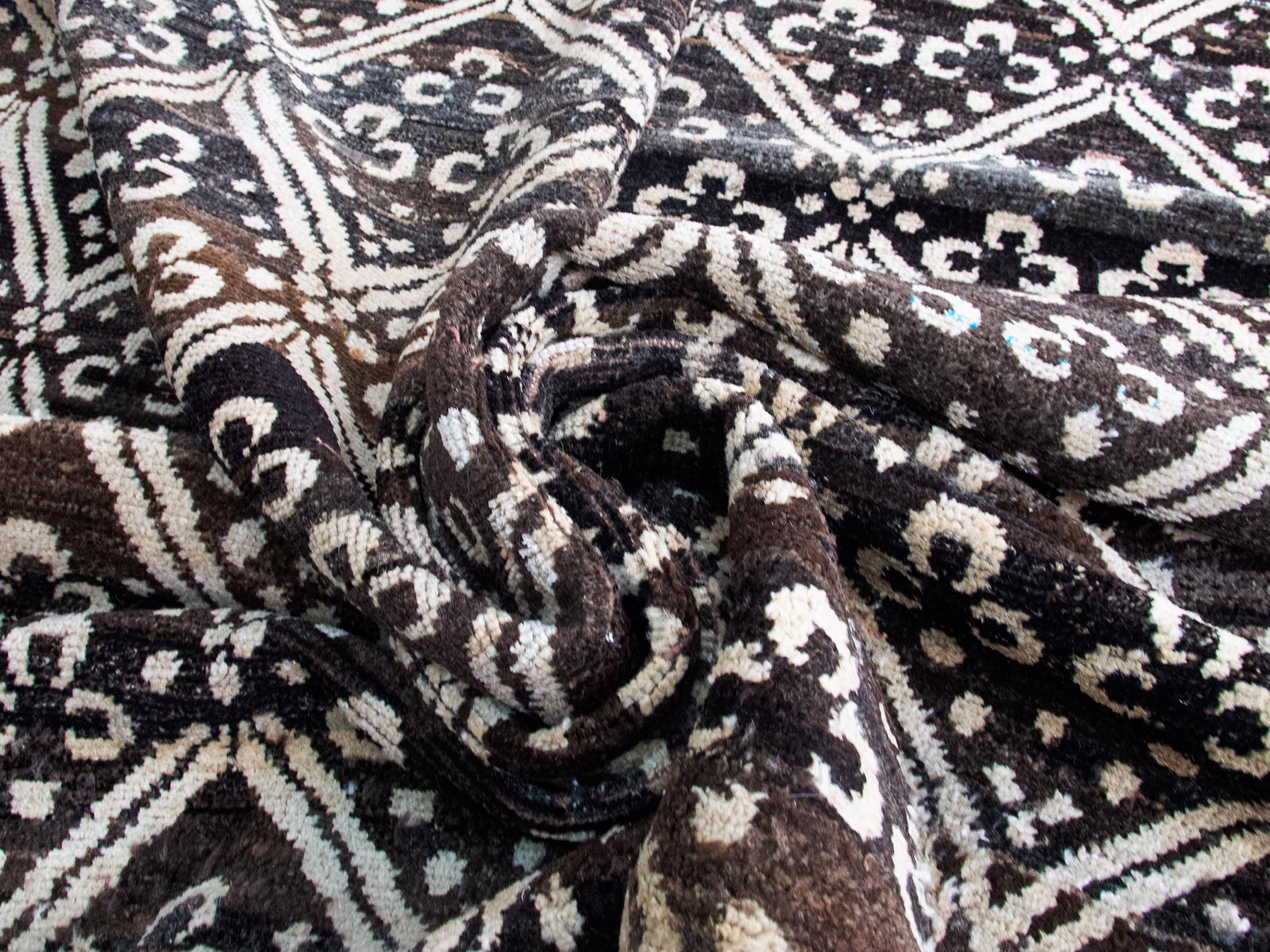 Hand woven wool rug with Chintamani pattern