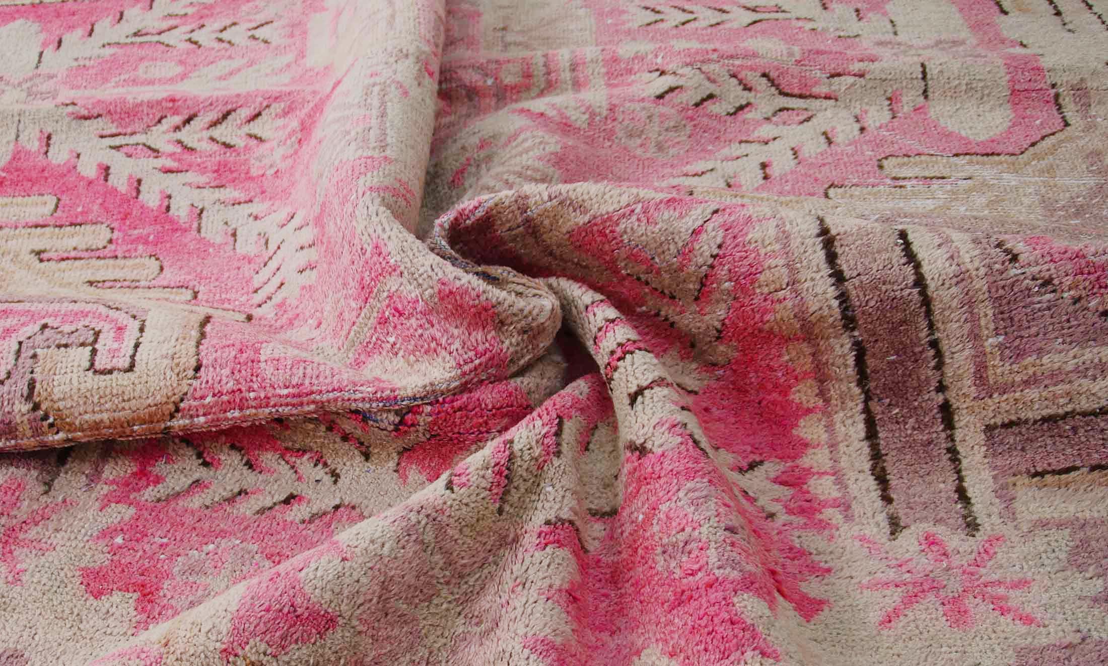 pastel pink distressed vintage Kars rug